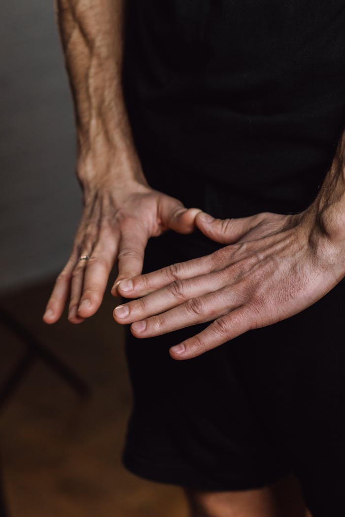 A Person Hand Gesture in Meditating